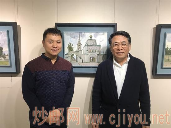 中国艺术研究院中国油画院杨飞云院长与参展艺术家黄远鹏在参展作品前合影留念